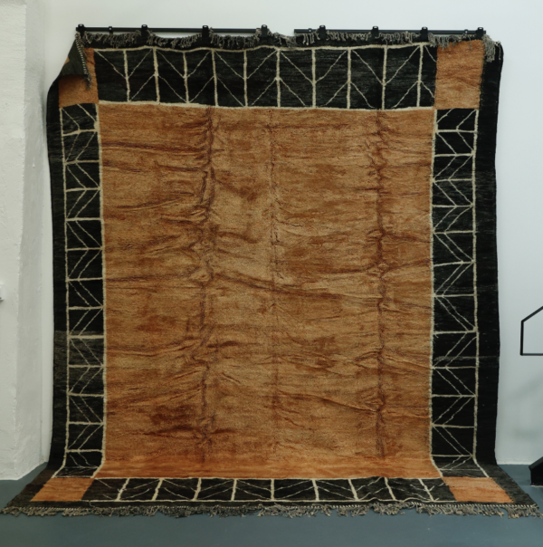 Amber Berber Wool Rug with Black Trim